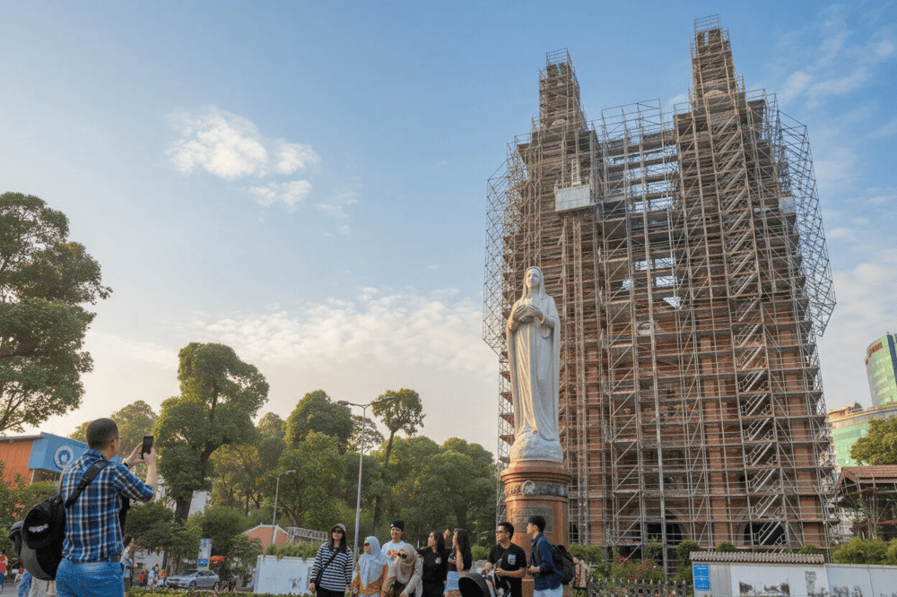 You can take photos in front of the church, where the iconic statue of Our Lady of Peace stands
